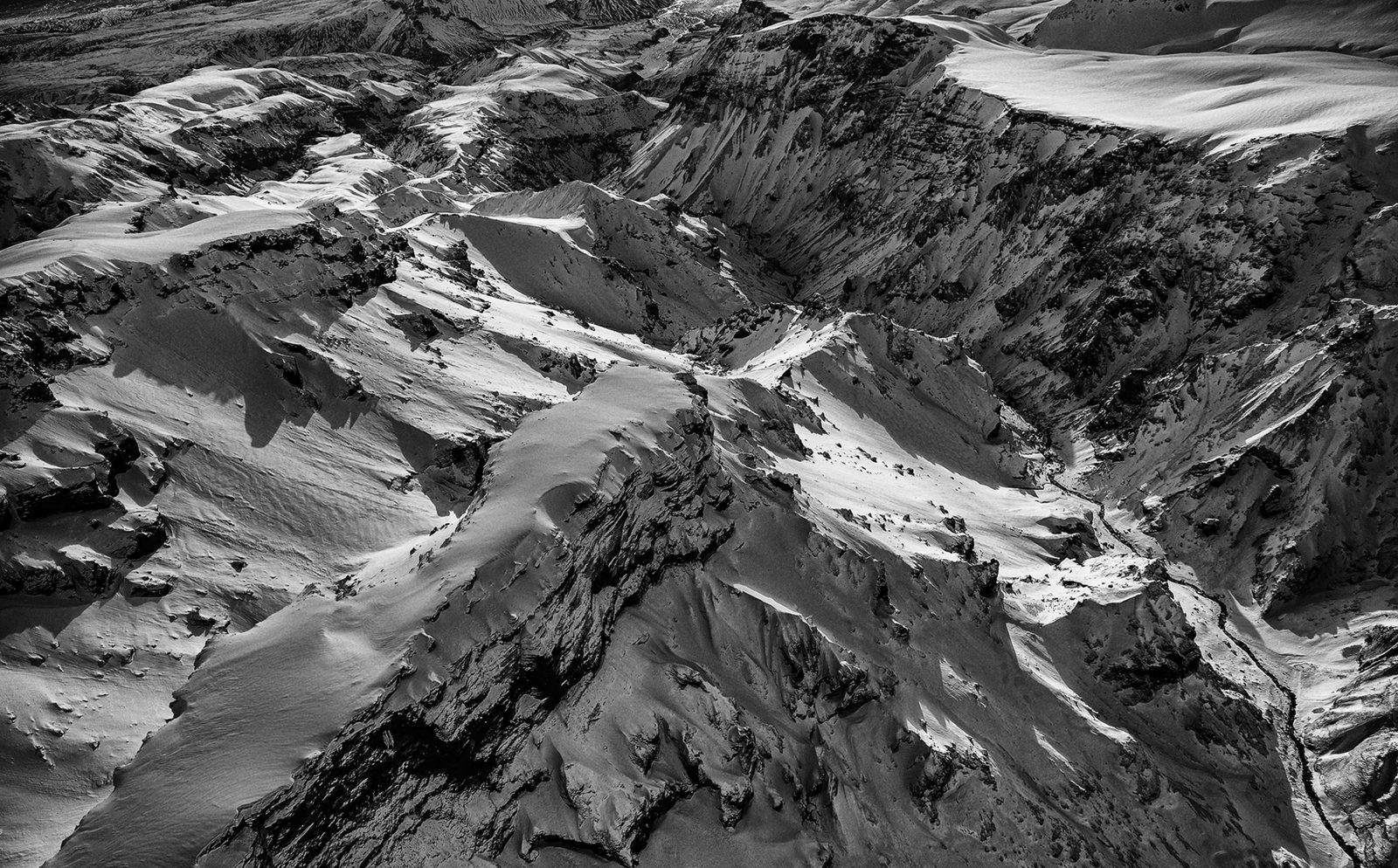 Aerial view of snow-covered mountain ridges